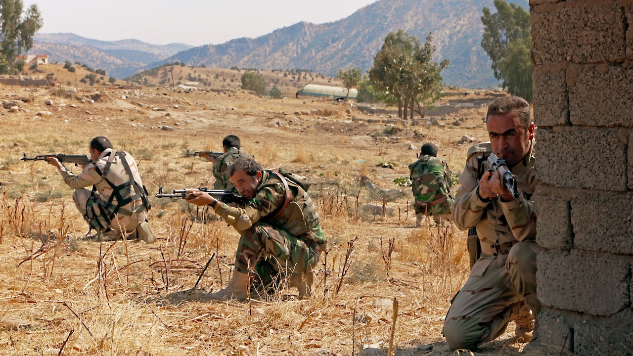 Peshmerga soldiers provide security during react-to-contact training near Irbil, Iraq, Oct. 11, 2015. The coalition runs five training sites in Iraq, where the coalition trains Iraqi and Peshmerga forces. This training is part of Combined Joint Task Force - Operation Inherent Resolve’s mission to build partner capacity and enable the Iraqi security forces to defeat the Islamic State of Iraq and the Levant. Army photo by Spc. Tristan Bolden