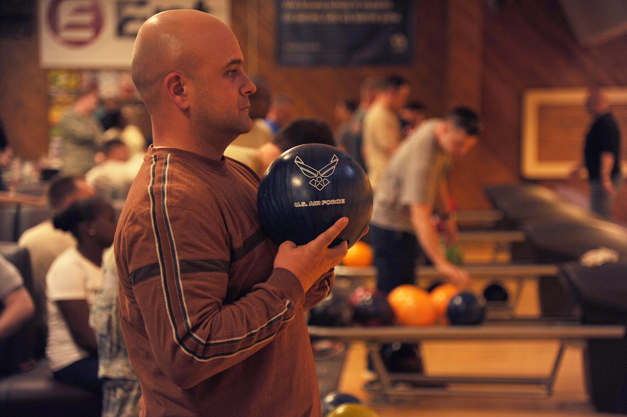 PETERSON AIR FORCE BASE, Colo. – Senior Airman Brian Roberts, a radio frequency transmissions technician with the 302nd Communications Flight, eyes the pins April 2, 2016, at the Peterson Air Force Base bowling center. The 302nd AW held its 14th annual bowling tournament during the April Unit Training Assembly. First place went to the 302nd Force Support Squadron, followed by the 34th Aeromedical Evacuation Squadron and the “Fresh Cakes” team, also from the 34th AES. (U.S. Air Force photo/Staff Sgt. Amber Sorsek)
