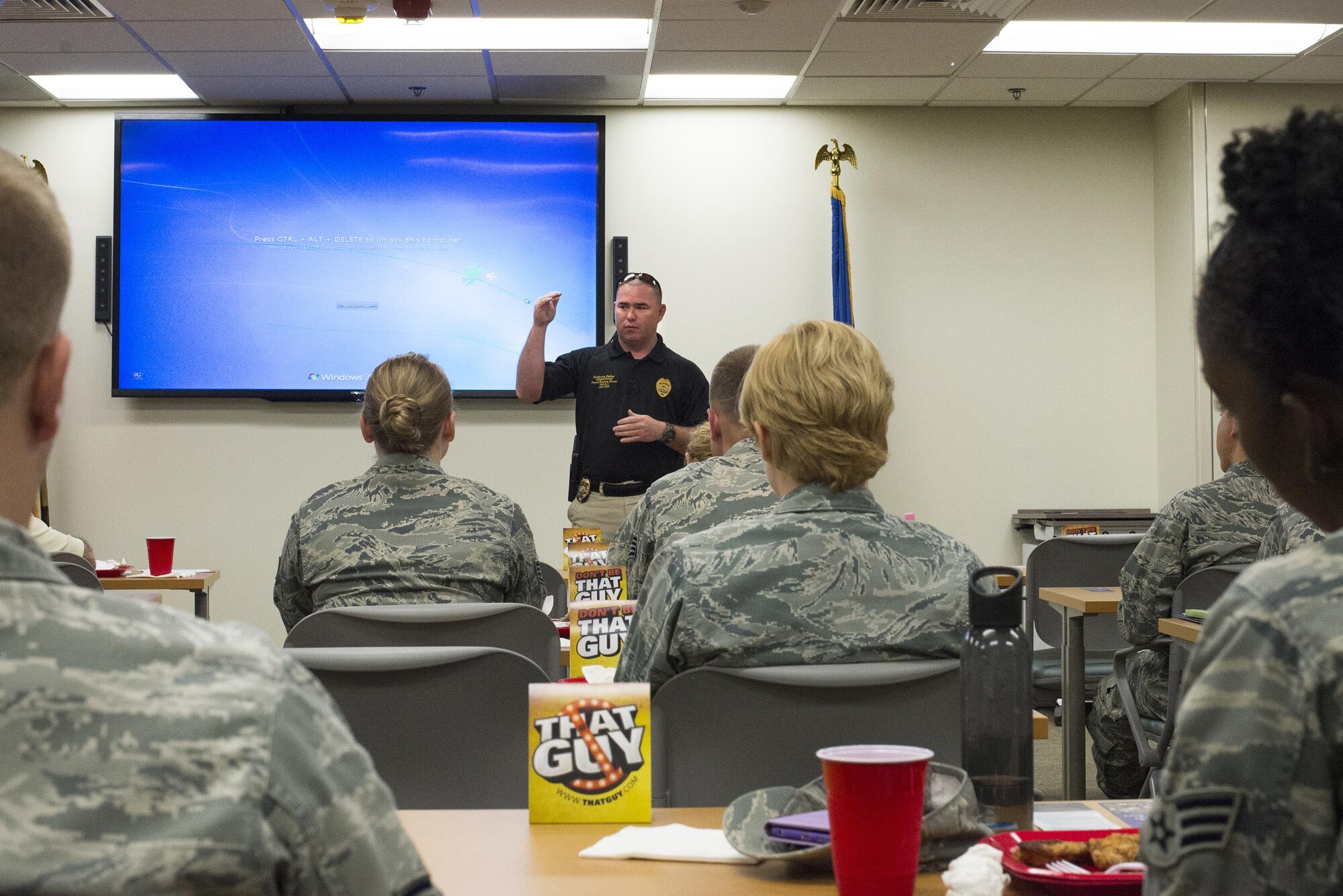 Valdosta Police Department patrolman, Alvin May, briefs Airmen on the dangers of drinking and driving during a lunch and learn, April 8, 2016, at Moody Air Force Base, Ga. Moody invited the VPD to speak to Airmen in observation of Alcohol Awareness Month. (U.S. Air Force photo by Airman Daniel Snider/Released)