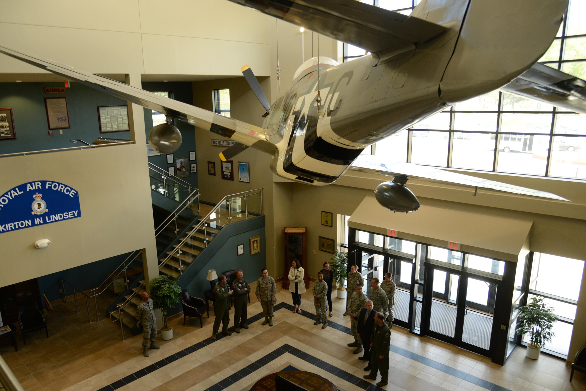 Maj. Gen. Mark Kelly, 9th Air Force commander, visits the Consolidated Support Center to view the P-51 Mustang aircraft, April 8, 2016, during a visit to Seymour Johnson Air Force Base, North Carolina. Kelly, a former 4th Fighter Wing commander, visited many facilities and viewed updates made to projects he played a role in creating. (U.S. Air Force photo/Staff Sgt. Chuck Broadway)