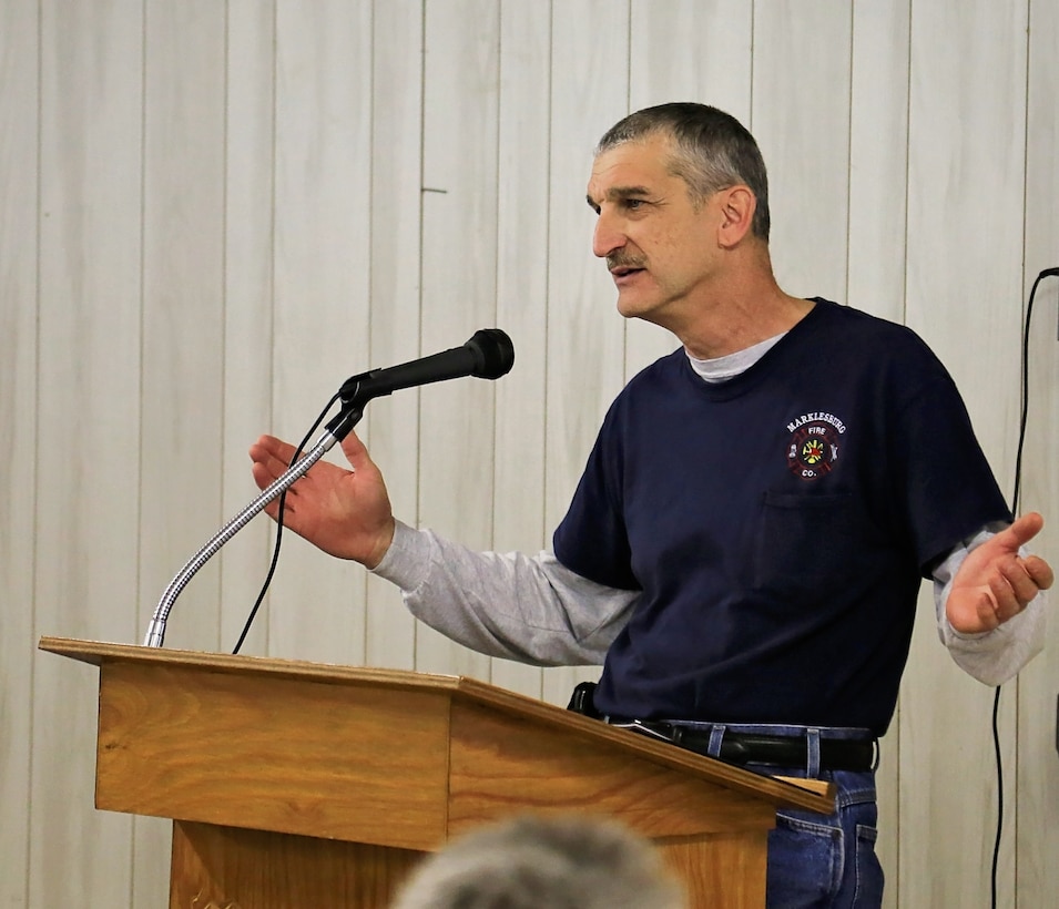 Marklesburg Volunteer Fire Department President Brian Hunsicker accepts the 2015 Excellence in Partnership Award on behalf of the fire company during an awards ceremony in Marklesburg, Pennsylvania, April 6, 2016.