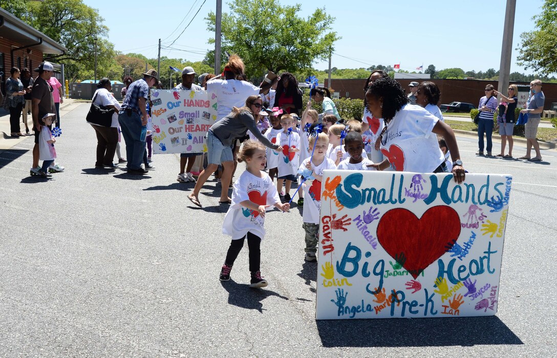 April is the time when Marine Corps Logistics Base Albany officials, base personnel and parents join the nation in celebration of the “Month of the Military Child.” The annual event is a month set aside to recognize the many sacrifices made by the military’s littlest warfighters, the children. The proclamation signing and a parade commenced at the installation’s Child Development Center and ended with a reception at Covella Pond, here, April 8.