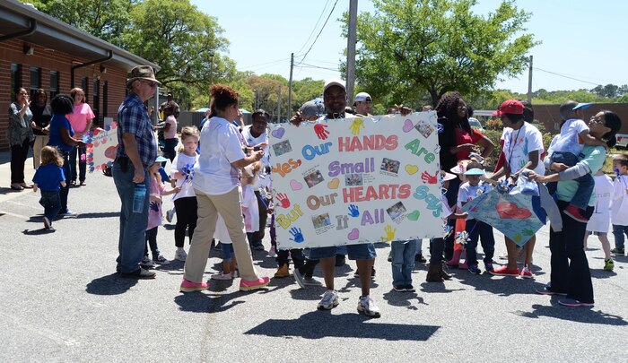 April is the time when Marine Corps Logistics Base Albany officials, base personnel and parents join the nation in celebration of the “Month of the Military Child.” The annual event is a month set aside to recognize the many sacrifices made by the military’s littlest warfighters, the children. The proclamation signing and a parade commenced at the installation’s Child Development Center and ended with a reception at Covella Pond, here, April 8.