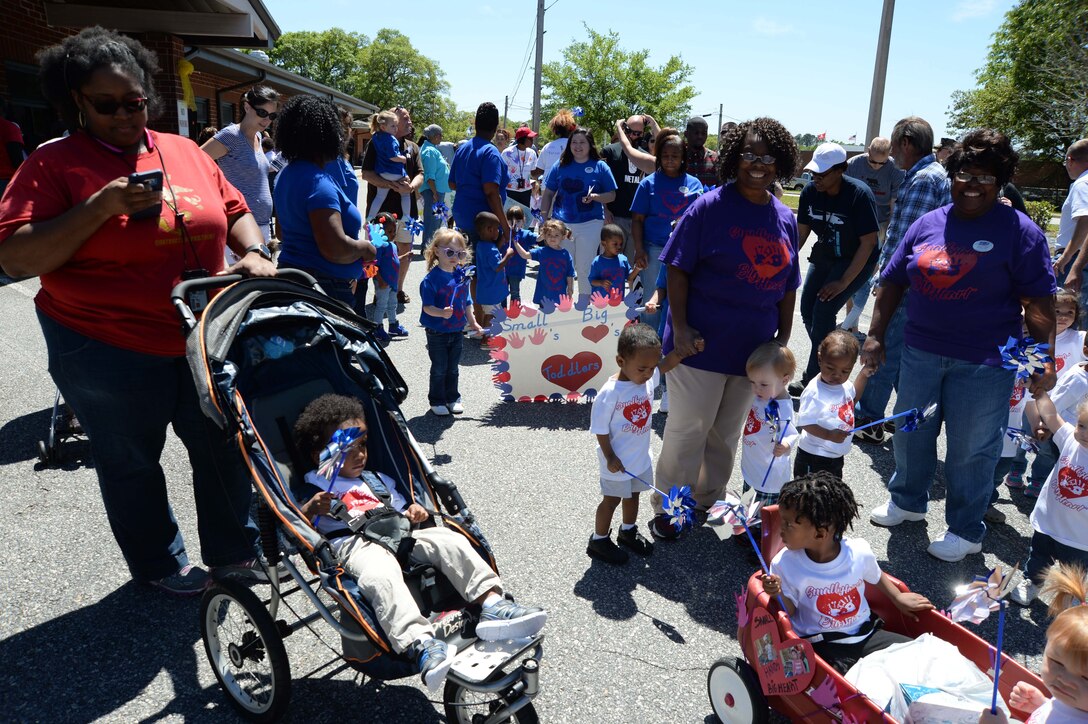 April is the time when Marine Corps Logistics Base Albany officials, base personnel and parents join the nation in celebration of the “Month of the Military Child.” The annual event is a month set aside to recognize the many sacrifices made by the military’s littlest warfighters, the children. The proclamation signing and a parade commenced at the installation’s Child Development Center and ended with a reception at Covella Pond, here, April 8.