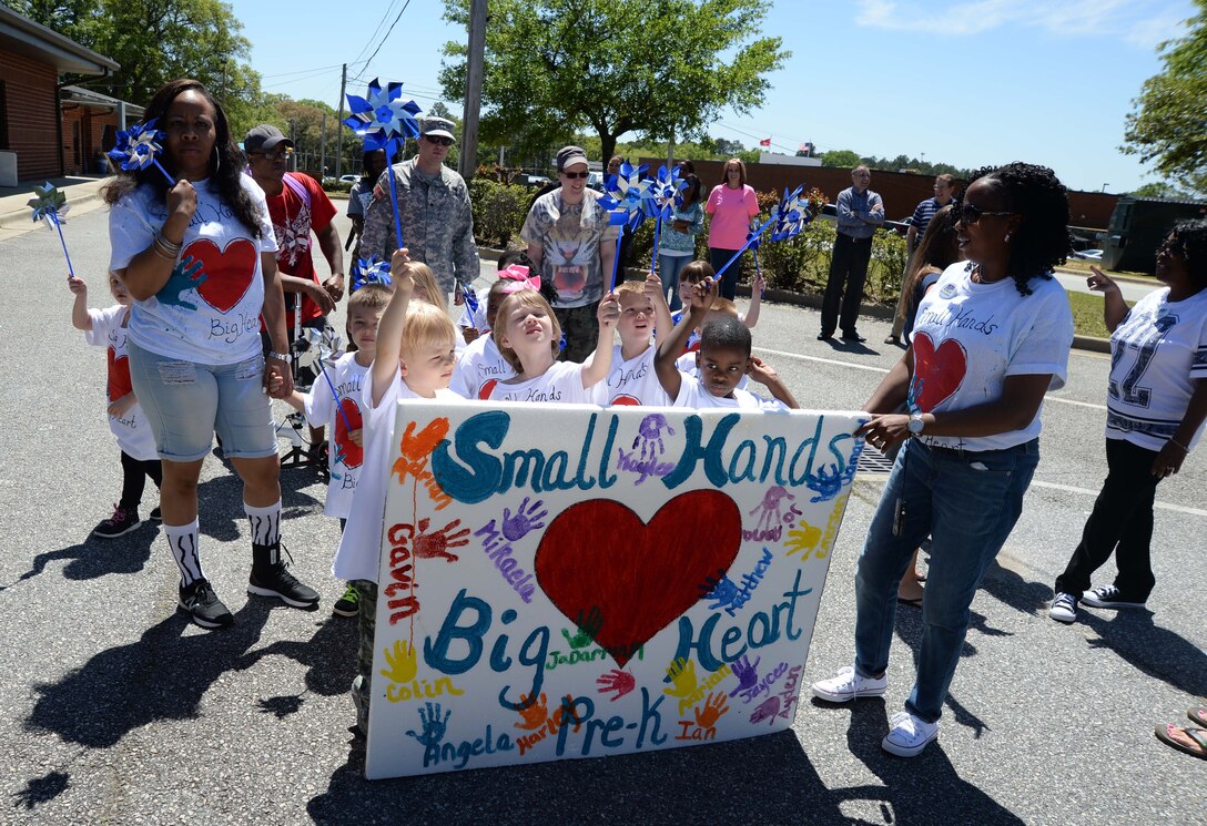 April is the time when Marine Corps Logistics Base Albany officials, base personnel and parents join the nation in celebration of the “Month of the Military Child.” The annual event is a month set aside to recognize the many sacrifices made by the military’s littlest warfighters, the children. The proclamation signing and a parade commenced at the installation’s Child Development Center and ended with a reception at Covella Pond, here, April 8.