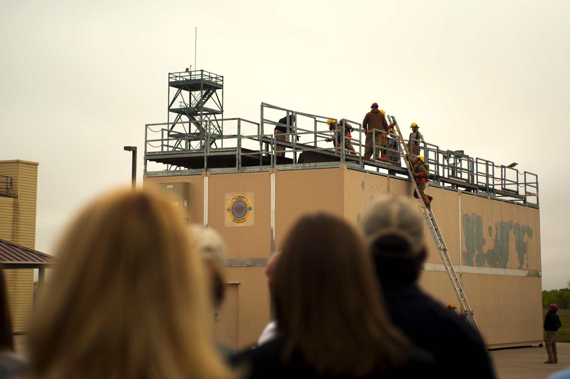 Leadership San Angelo watches students of the Louis F. Garland Department of Defense Fire Academy during a tour of Goodfellow Air Force Base, Texas, April 14, 2016. The Leadership San Angelo referred to this day as "Chamber Day" where the group picks an important topic for the group to learn. This day’s topic was tourism and local employment. (U.S. Air Force photo by Senior Airman Scott Jackson/Released)