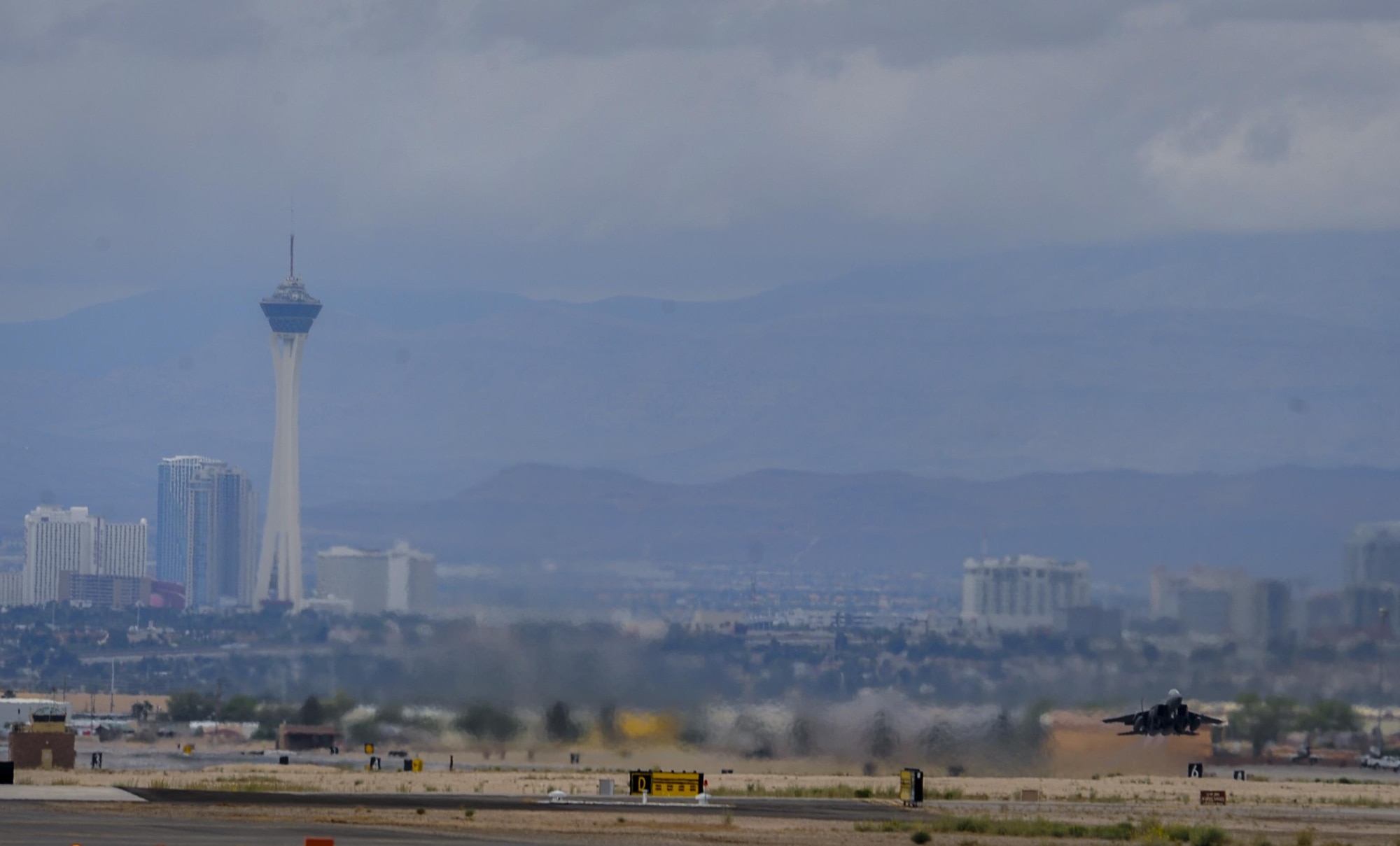Brig. Gen. Christopher M. Short, 57th Wing commander, takes off in an F-15E Strike Eagle during his fini flight at Nellis Air Force Base, Nev., April 8, 2016. Short is responsible for 39 squadrons at 12 installations comprising the Air Force's most diverse flying wing. (U.S. Air Force photo by Airman 1st Class Kevin Tanenbaum)