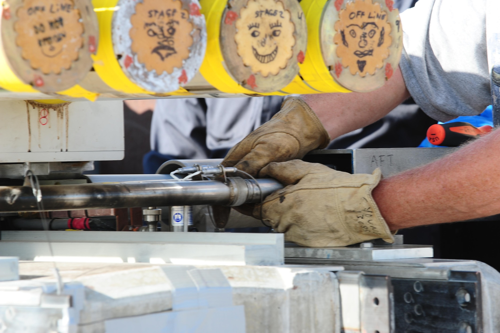 A technician from the 846th Test Squadron at Holloman Air Force Base, N.M., helps prepare a sled for a launch here Aug. 18, 2015. This magnetically-levitated sled system tests weapon system components in a controlled environment. (U.S. Air Force photo by Airman 1st Class Randahl J. Jenson)   

