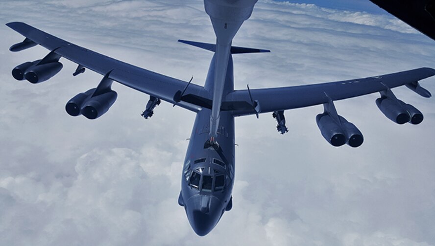 A KC-10 flown by Airmen of 514th Operations Group refuels a B-52 in route to the Central Command area of responsibility. Without the fuel provided by air refueling, the B-52 would have to make several stops along a less-direct route to its destination, which would pose a significant increase in travel time. (U.S. Air Force photo by Master Sgt. Donna Jeffries)