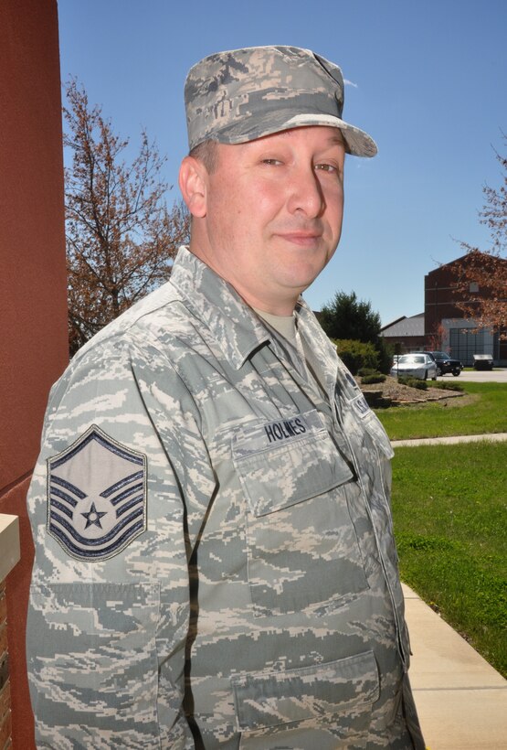 Master Sgt. Jeffrey Holmes, 932nd Airlift Wing noncommissioned officer in charge of readiness, discusses his plans for the spring.  Holmes said he is planning on taking a couple weeks off for a much-needed vacation in April. He plans to step outside and spend his time off with Mother Nature camping, hiking, fishing or rafting down a raging river.  Holmes said all electronics will be disconnected and the focus will be on nature.  (U.S. Air Force Photo by Staff Sgt. Amber Hodges)