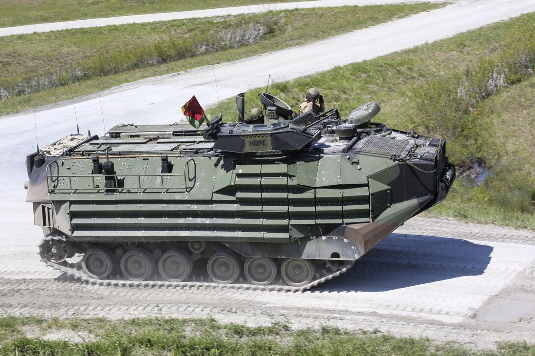 Marines with Alpha Company, 2nd Assault Amphibian Battalion maneuver downrange in an amphibious assault vehicle during a gunnery skills exercise at Camp Lejeune, N.C., April 13, 2016. The company conducted the training to prepare for their upcoming participation in the Integrated Training Exercise. (U.S. Marine Corps photo by Cpl. Paul S. Martinez/Released)