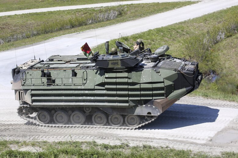 Marines with Alpha Company, 2nd Assault Amphibian Battalion maneuver downrange in an amphibious assault vehicle during a gunnery skills exercise at Camp Lejeune, N.C., April 13, 2016. The company conducted the training to prepare for their upcoming participation in the Integrated Training Exercise. (U.S. Marine Corps photo by Cpl. Paul S. Martinez/Released)