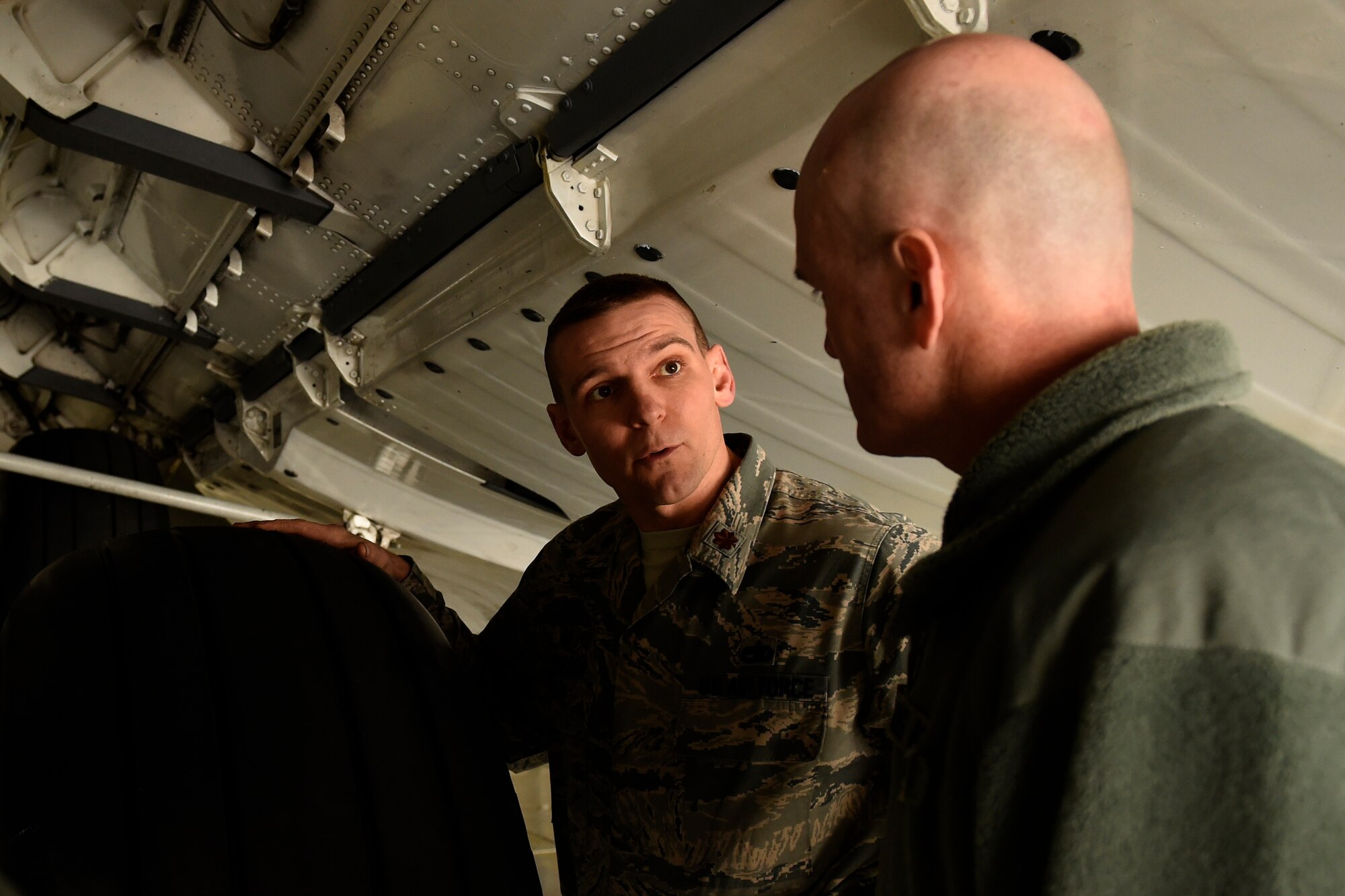 Air Force Maj. David Thompson (left), 62nd Maintenance Squadron commander, briefs Gen. Carlton D. Everhart II, Air Mobility Command commander, April 5, 2016 at Joint Base Lewis-McChord. Everhart, along with Chief Master Sgt. Shelina Frey, AMC command chief, visited JBLM for the first time since they assumed their AMC leadership roles. (U.S. Air Force photo/Tech. Sgt. Tim Chacon) 