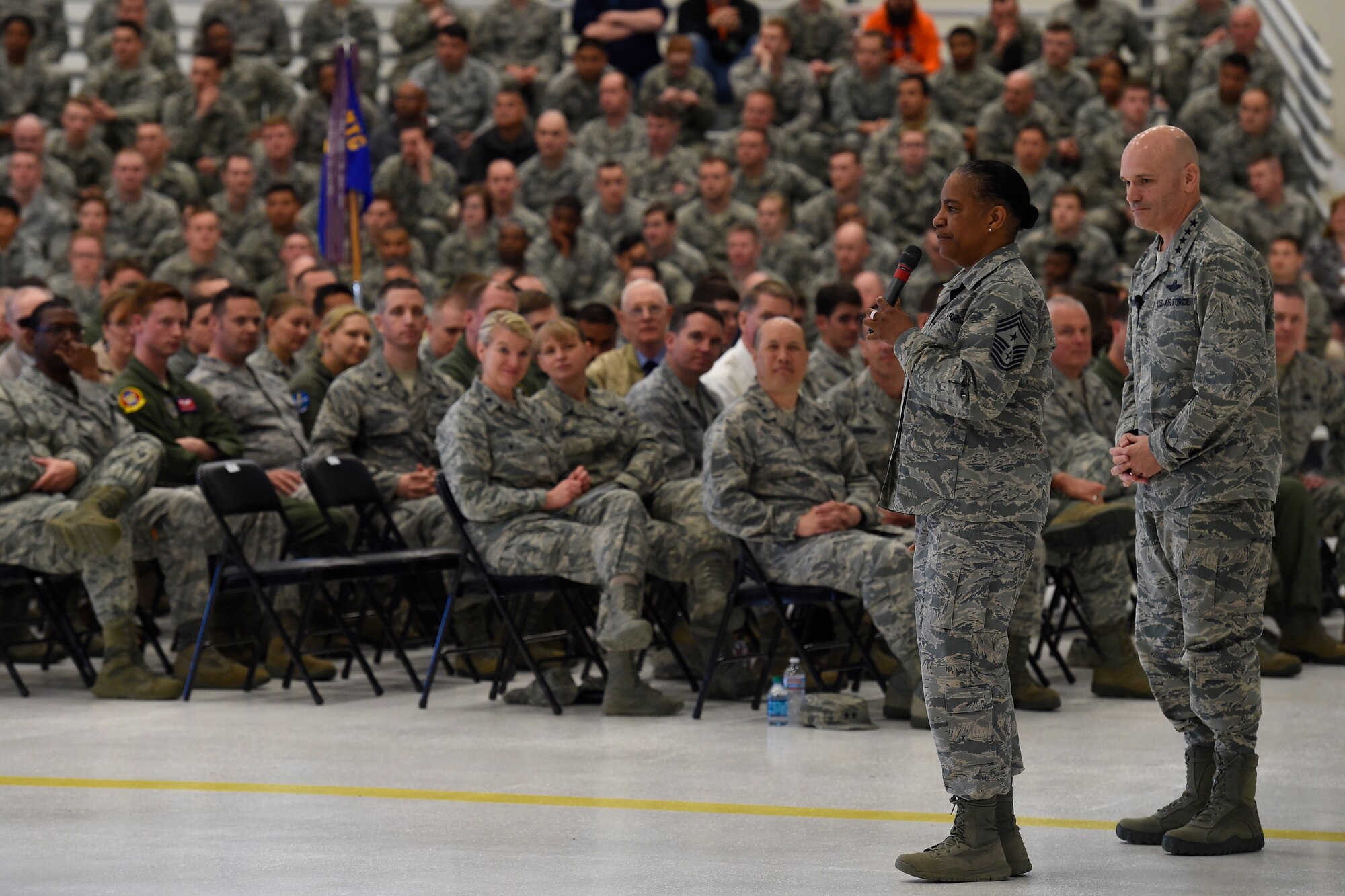Gen. Carlton D. Everhart II, Air Mobility Command commander, and Chief Master Sgt. Shelina Frey, AMC command chief, speak during an all call at Joint Base Lewis-McChord, Wash. April, 7, 2016. Both Everhart and Frey discussed the proposed increase of U.S. Air Force Airmen from 311,000 to 317,000 within the year. 