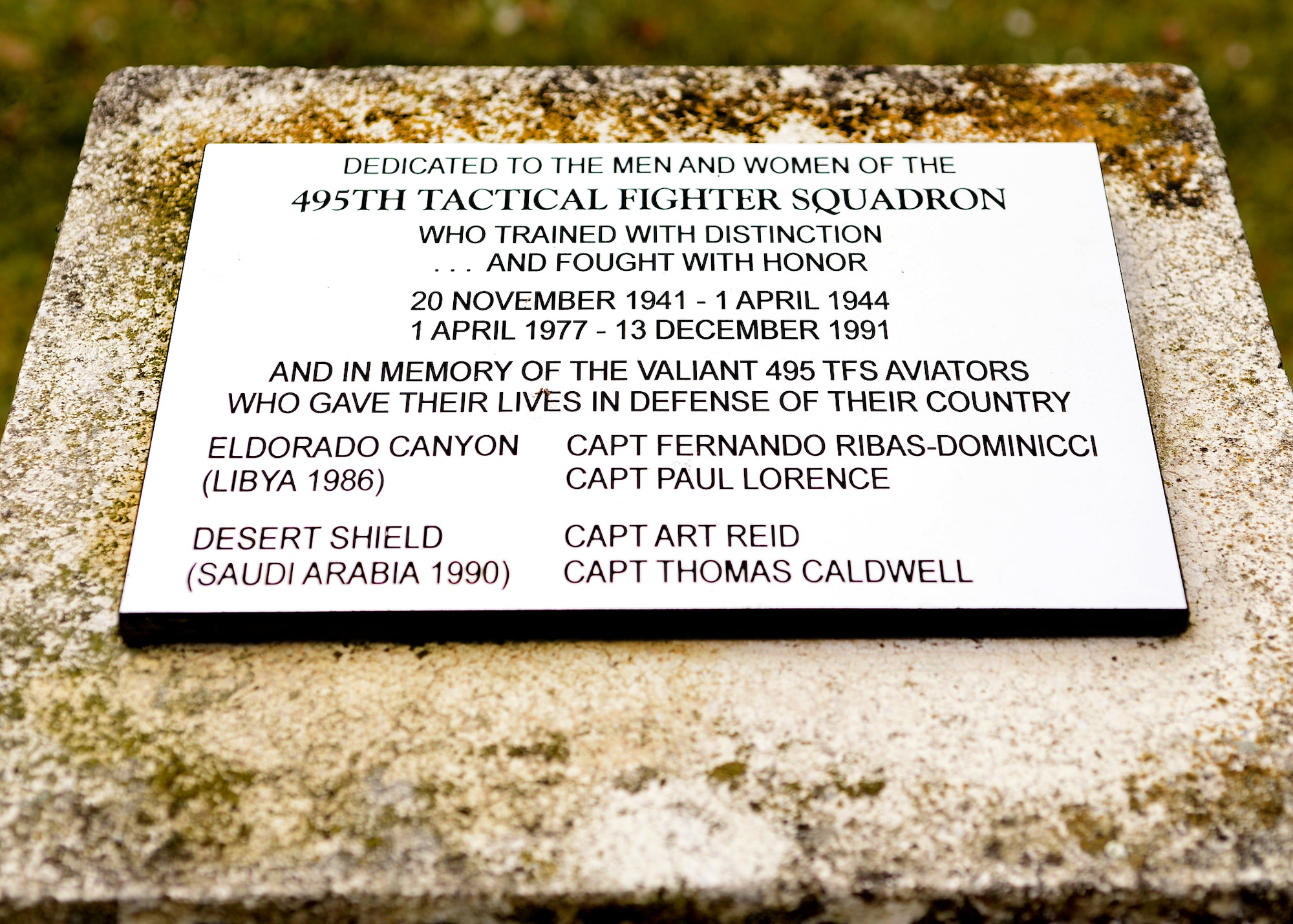 A monument dedicated to the men and women of the 495th Tactical Fighter Squadron was placed across from the 48th medical group at Royal Air Force Lakenheath, England, Dec. 13, 1991. Inscribed on the plaque are the names of Captains Ribas-Dominicci and Lorence’s in memory of their service and sacrifice during Operation El Dorado Canyon. (U.S. Air Force photo/Tech. Sgt. Matthew Plew)