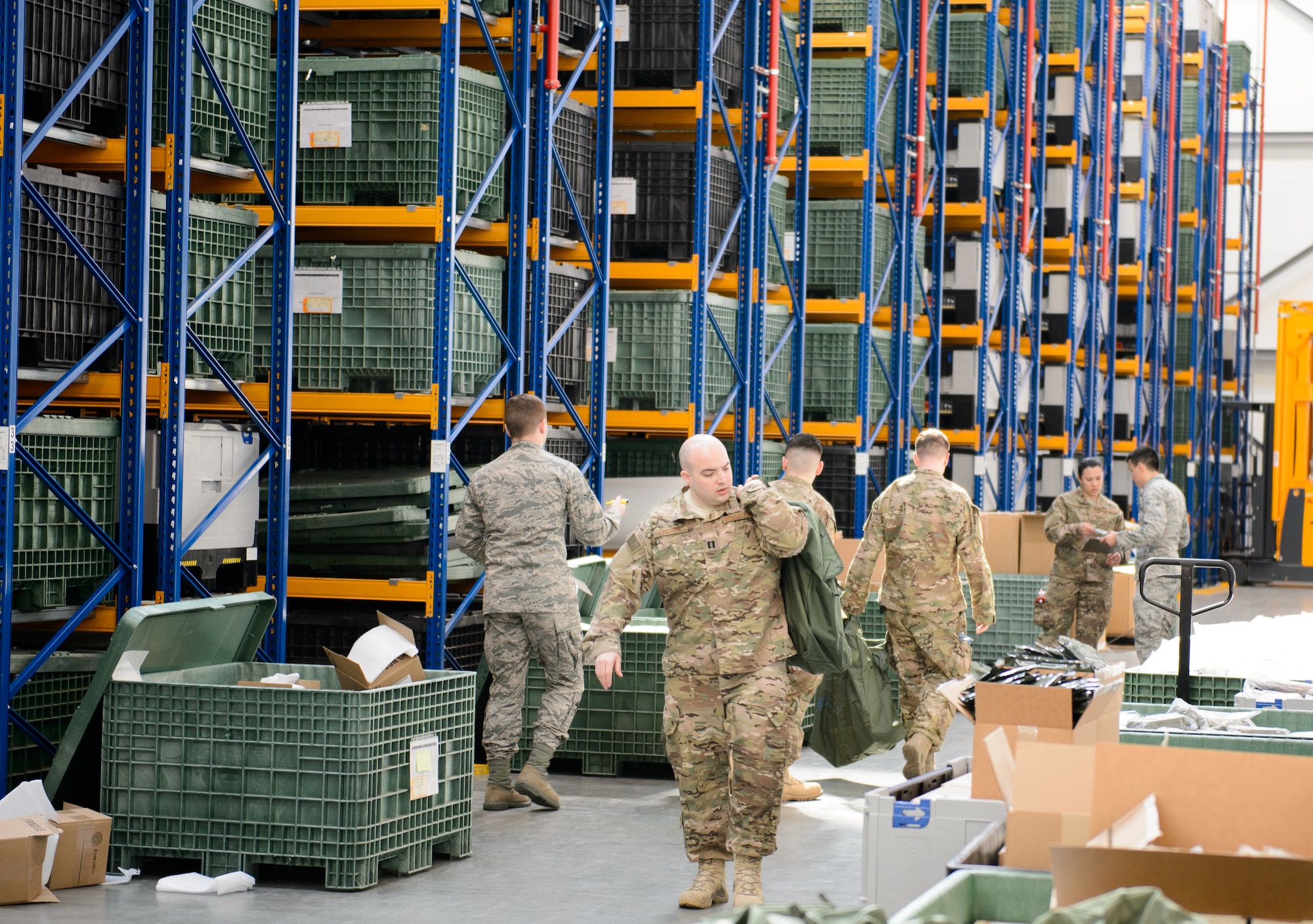 Airmen from the 435th Air Ground Operations Wing receive deployment gear in preparation for a deployment from Ramstein Air Base, Germany, April 11, 2016. The 435th AGOW is preparing to complete one of its primary missions of building air bases from the ground up. (U.S. Air Force photo/Staff Sgt. Armando A. Schwier-Morales)