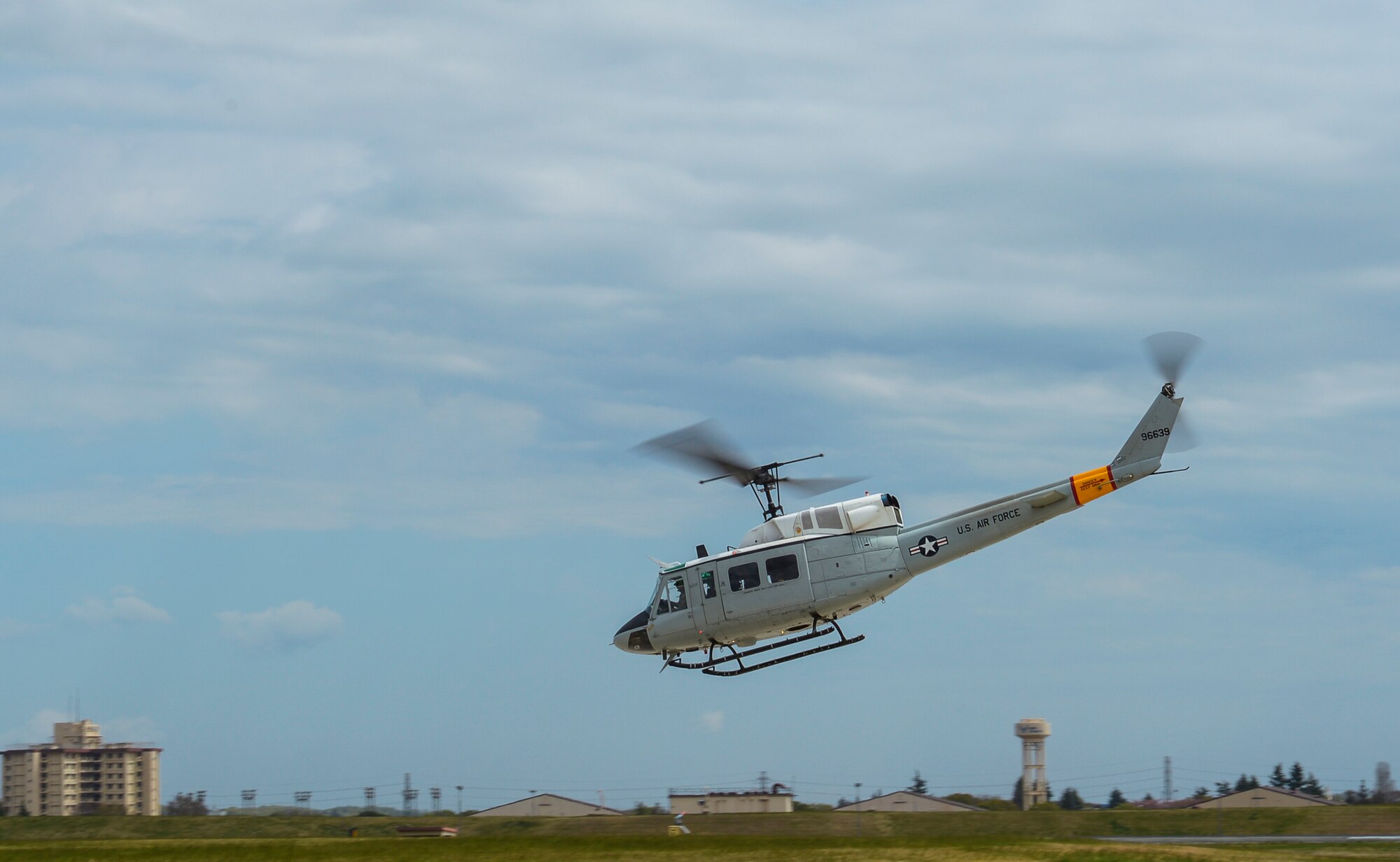 Lt. Gen. John Dolan, U.S. Forces, Japan and 5th Air Force commander, pilots a 459th Airlift Squadron UH-1N Iroquois at Yokota Air Base, Japan, April 11, 2016. Yokota’s UH-1Ns are primarily used for local airlift, but they are also equipped with hoist capabilities and can be used for search and rescue operations. (U.S. Air Force photo by Airman 1st Class Elizabeth Baker/Released)