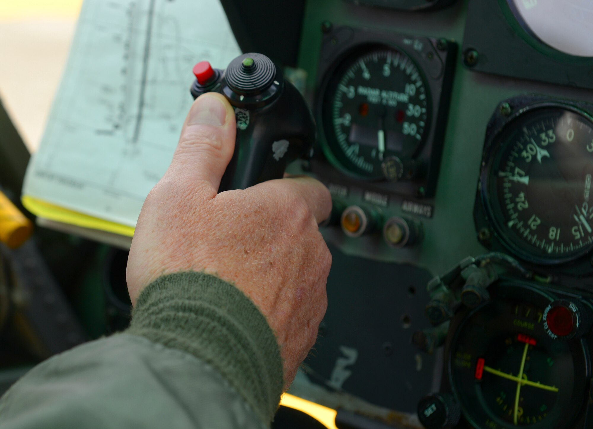 Lt. Gen. John Dolan, U.S. Forces, Japan and 5th Air Force commander, familiarizes himself with the controls of a UH-1N Iroquois at Yokota Air Base, Japan, April 11, 2016. Several key leaders have flown 459th Airlift Squadron UH-1Ns as part of key staff pilot courses, including Dolan, Col. Douglas DeLaMater, 374th Airlift Wing commander, and Col. Robert Dotson, 374th Operations Group commander.. (U.S. Air Force photo by Airman 1st Class Elizabeth Baker/Released)