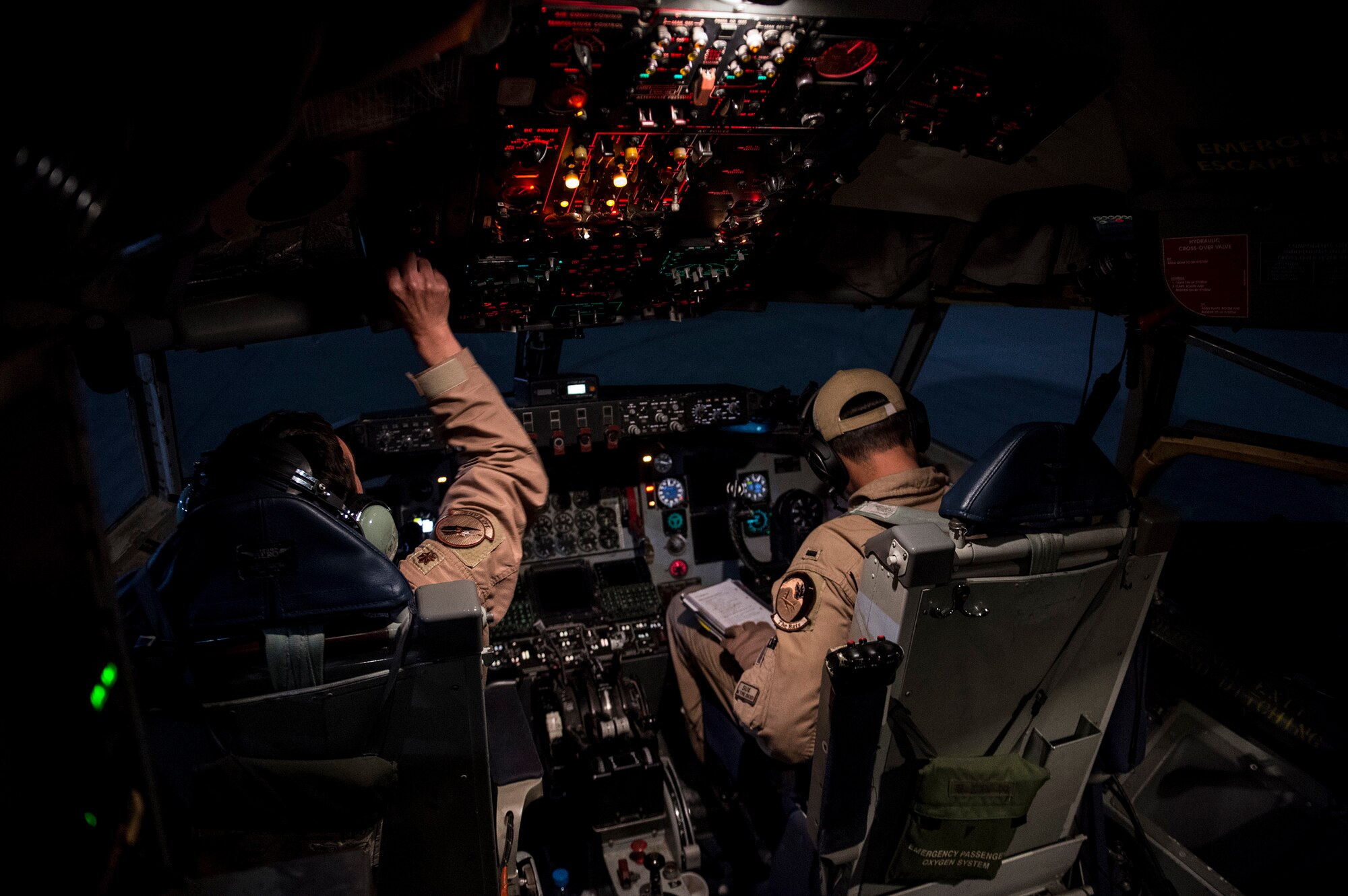 U.S. Air Force aircrew assigned to the 340th Expeditionary Air Refueling Squadron return from flight on a KC-135 Stratotanker at Al Udeid Air Base, Qatar, April 8, 2016. Coalition forces fly daily missions in support of Operation Inherent Resolve. OIR is the coalition intervention against the Islamic State of Iraq and the Levant. (U.S. Air Force photo by Staff Sgt. Corey Hook/Released)
