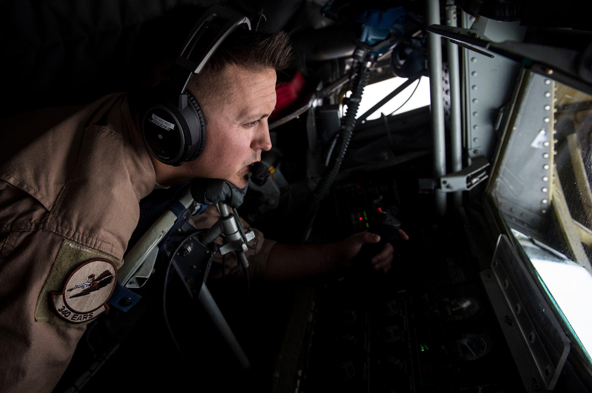 U.S. Air Force Tech Sgt. Matthew Prosser operates the boom of a KC-135 Stratotanker over Iraq in support of Operation Inherent Resolve, April 8, 2016. Prosser is a boom operator deployed out of the 185th Air Refueling Wing, Iowa Air National Guard. OIR is the coalition intervention against the Islamic State of Iraq and the Levant. (U.S. Air Force photo by Staff Sgt. Corey Hook/Released)