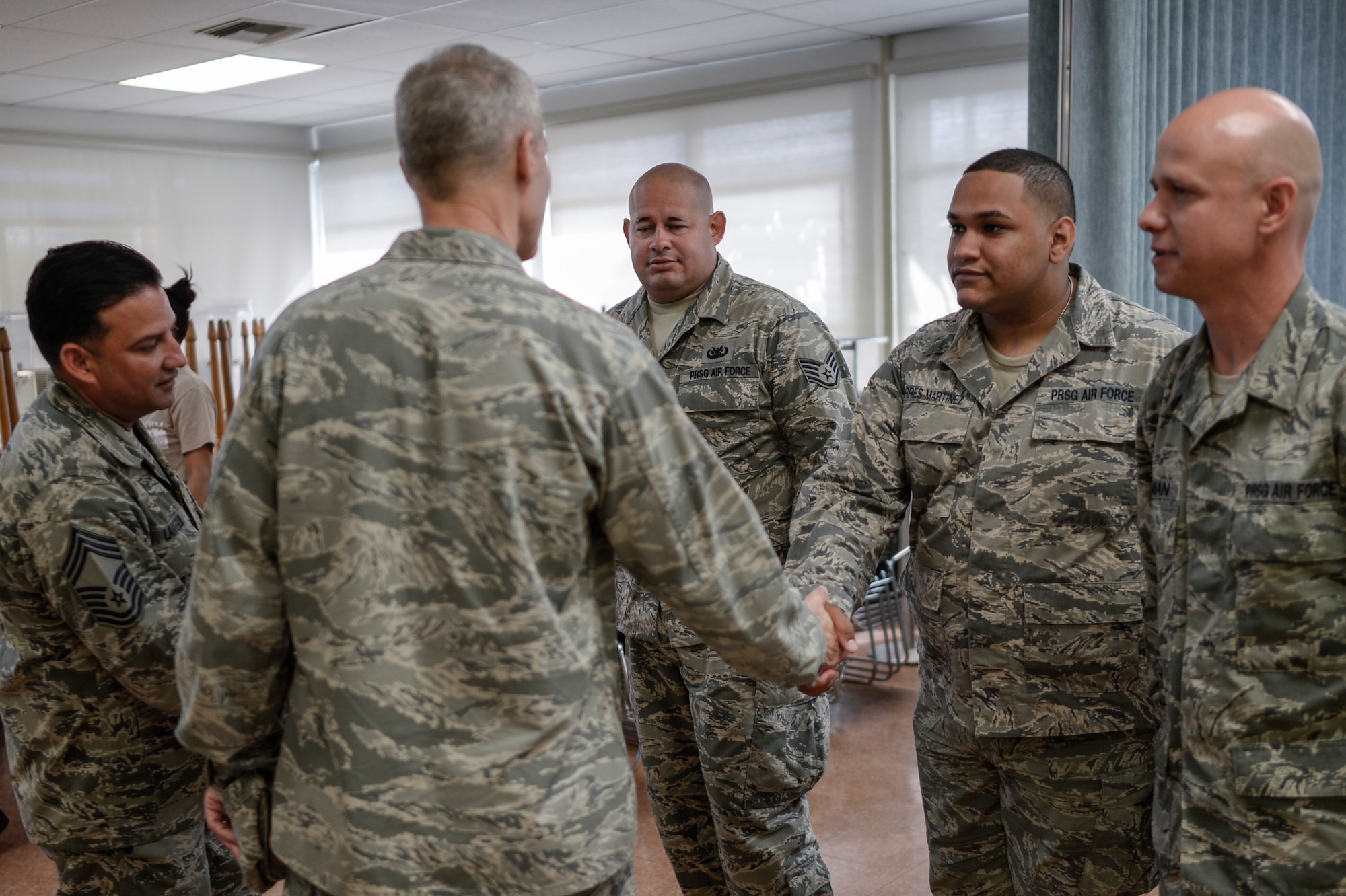 U.S. Air Force Acting Director, Air National Guard, Maj. Gen. Brian G. Neal, greets airmen of the 156th Force Support Squadron during his April 9 visit to the 156th Airlift Wing, Muñiz Air National Guard Base, Carolina, Puerto Rico. Neal attended briefings and toured facilities at the 156th AW and the 141st Air Control Squadron, Punta Borinquen Radar Site, Aguadilla, Puerto Rico. (U.S. Air  National Guard photo by Staff Sgt. Christian Jadot)