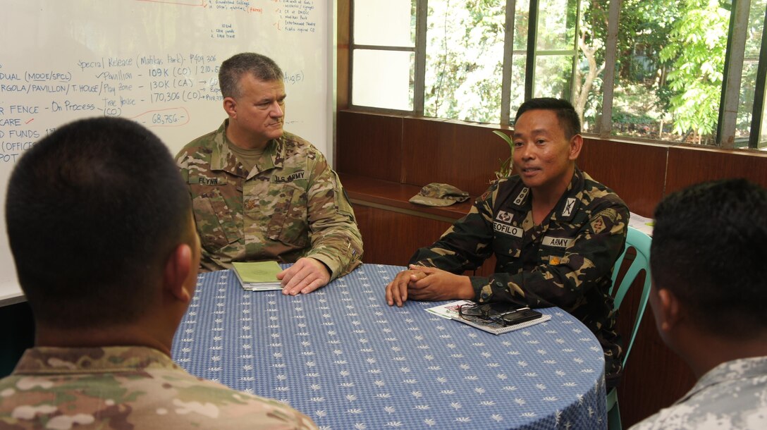 Hawaii Army National Guard, Major Willam Flynn, acting Commander of the Hawaii National Guard CERF-P team and members of his full-time staff meet with Philippine Army, Col. Teofilo Commander Camp Capinpin, to discuss the plan for the United Search and Rescue exercise to be held during Balikatan 2016 April 07, 2016, Camp Capinpin, Philippines. (US Air Force Photo by Tech. Sgt. Andrew Jackson) The Hawaii National Guard CERF-P team is supporting Balikatian 2016 through the National Guard State Partnership Program with the aim of building capability across the disaster response forces of both countries. Balikatan, which means "shoulder to shoulder" in Filipino, is an annual bilateral training exercise aimed at improving the ability of Philippine and U.S. military forces to work together during planning, contingency and humanitarian assistance and disaster relief operations. 
