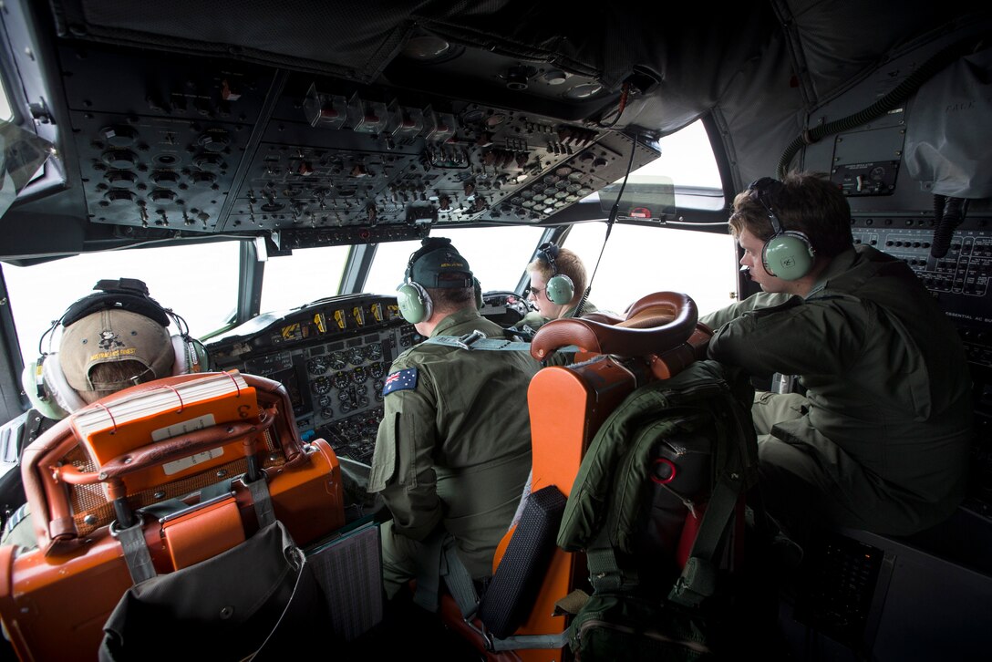 The flight crew of a Royal Australian Air Force No 11 Squadron AP-3C Orion maritime patrol aircraft fly a training mission during Exercise Balikatan 2016. 