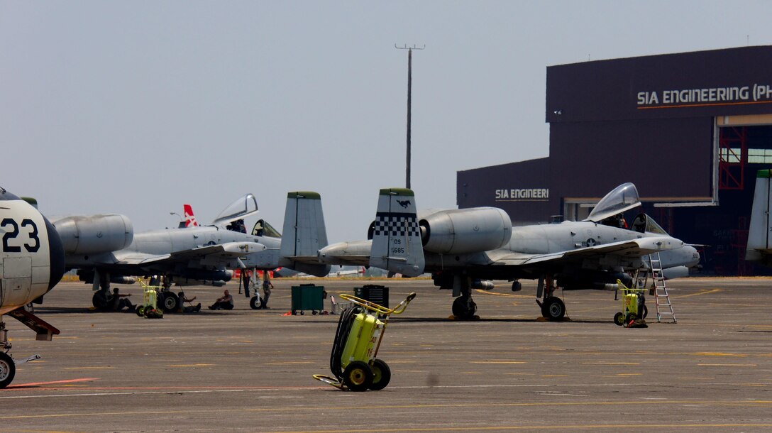 A-10s from the 25th Fighter Group out of Osan Korea sit on the flight line of Clark Air Base, Philippines  after flying  missions for Balikatan 2016, April 14 2016. 