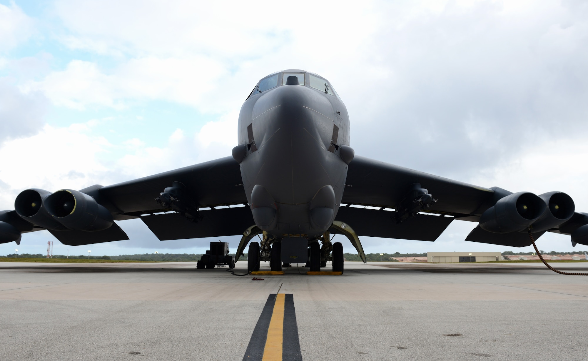 A U.S. Air Force B-52 Stratofortress bomber sits on the flightline April 14, 2016, at Andersen Air Force Base, Guam. The strategic global strike capability of B-52’s deters potential adversaries and provides reassurance to allies and partners that the U.S. is capable to defend its national security interests in the Indo-Asia-Pacific region. (U.S. Air Force photo by Airman 1st Class Arielle Vasquez/Released)