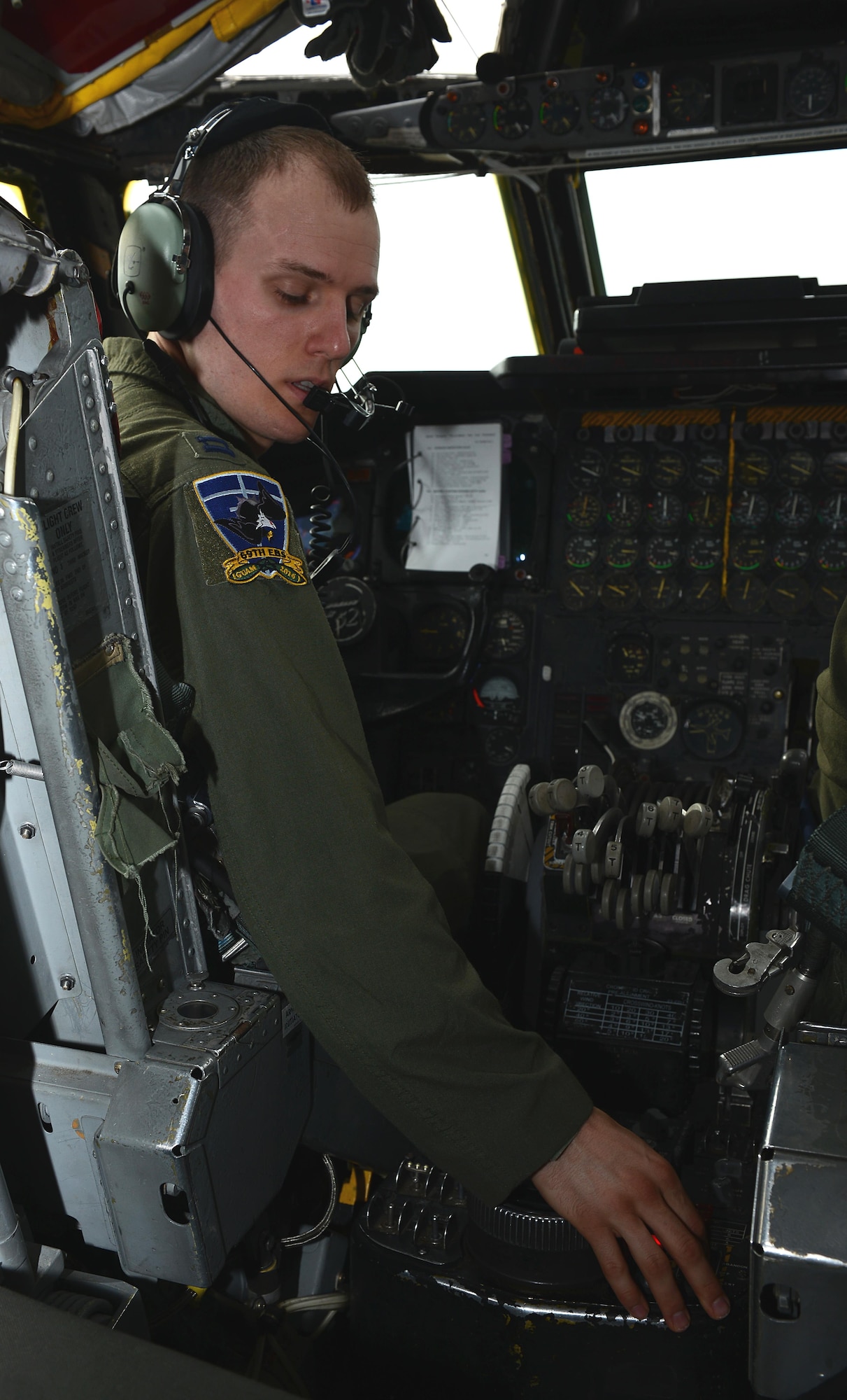 Capt. Chauncy Rockwell, a 69th Expeditionary Bomb Squadron pilot, performs a pre-flight inspection inside a U.S. Air Force B-52 Stratofortress bomber April 14, 2016, at Andersen Air Force Base, Guam. The U.S. Pacific Command has maintained a rotational strategic bomber presence in the Indo-Asia-Pacific region for more than a decade. (U.S. Air Force photo by Airman 1st Class Arielle Vasquez/Released)