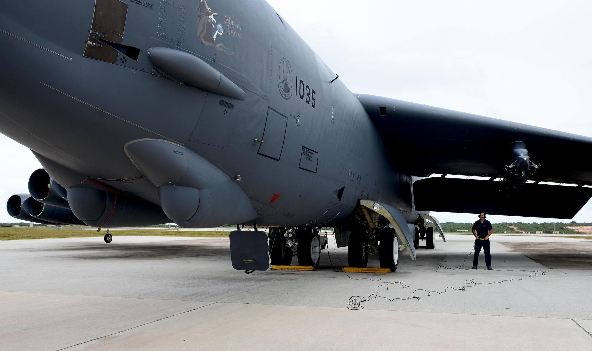 Airman 1st Class Richard Bradley, a crew chief with the 36th Expeditionary Aircraft Maintenance Squadron, waits for instructions from aircrew during pre-flight inspections April 14, 2016, at Andersen Air Force Base, Guam. The U.S. Air Force B-52 Stratofortress bomber is a long-range, heavy bomber that can fly up to 50,000 feet and has the capability to carry 70,000 pounds of nuclear or precision guided conventional ordnance with worldwide precision navigation capability. (U.S. Air Force photo by Airman 1st Class Arielle Vasquez/Released)