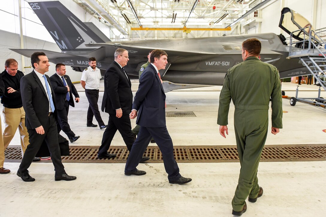 Deputy Defense Secretary Bob Work, third from right, and British Minister of State for Defense Procurement Philip Dunne visit the Marine Fighter Attack Training Squadron 501's facility at Marine Corps Air Station Beaufort, S.C., April 14, 2016. DoD photo by Army Sgt. 1st Class Clydell Kinchen