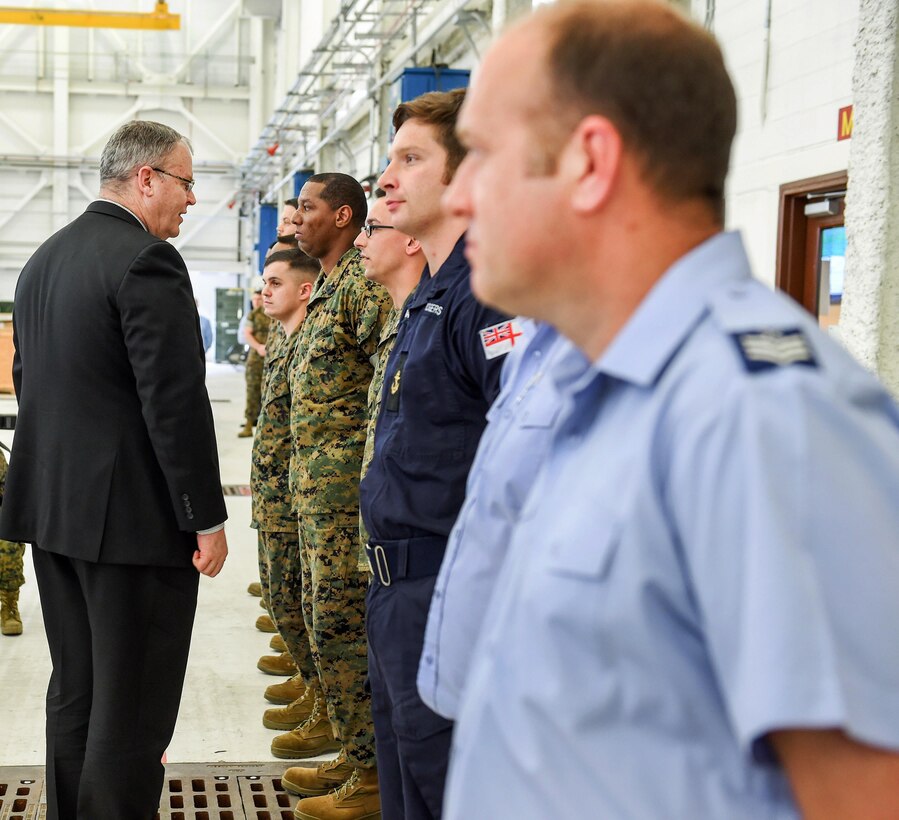 Deputy Defense Secretary Bob Work, left, meets with U.S. and British pilots from the Marine Fighter Attack Training Squadron 501 at Marine Corps Air Station Beaufort, S.C., April 14, 2016. DoD photo by Army Sgt. 1st Class Clydell Kinchen