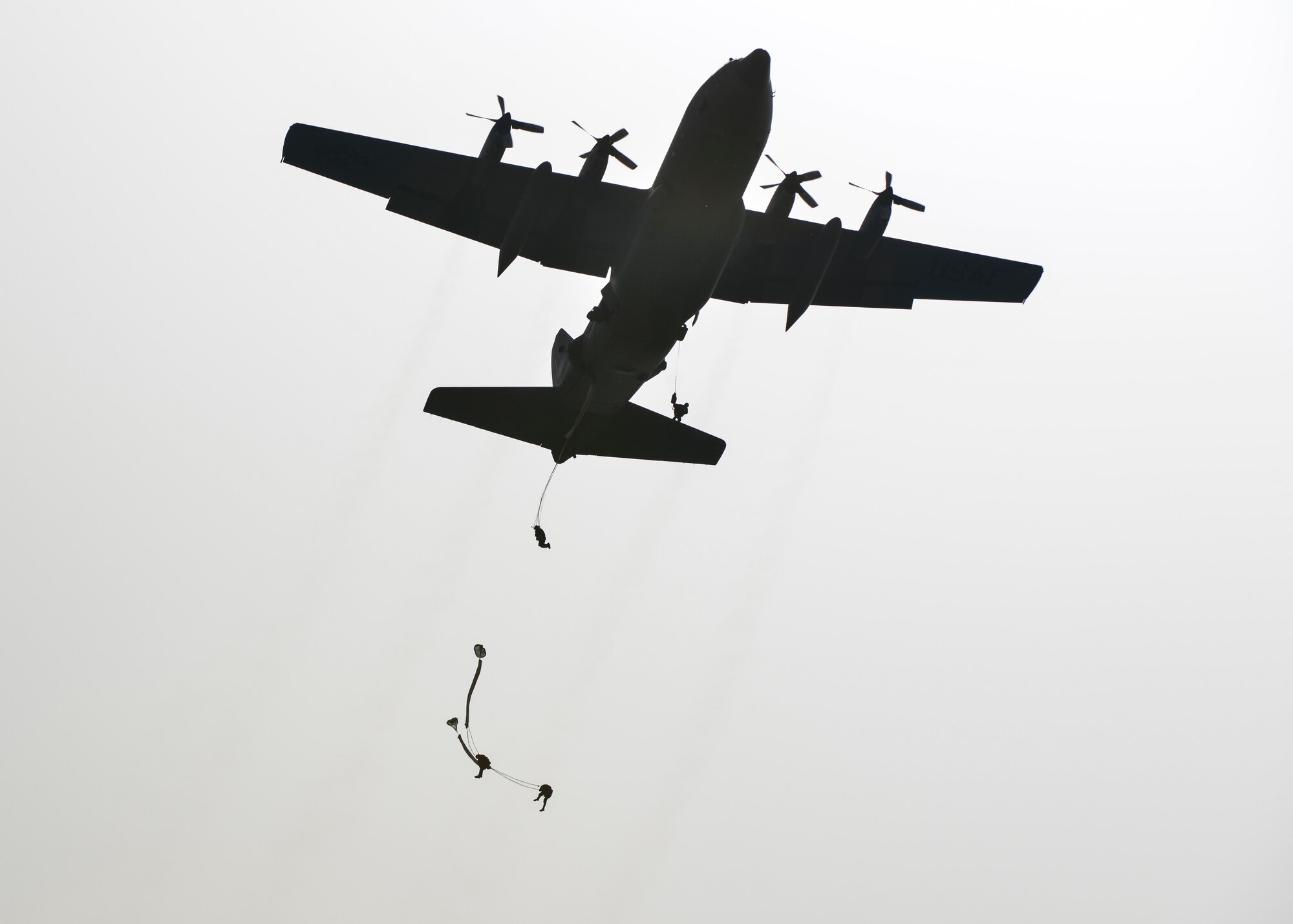 Soldiers and NATO service members participate in a jump exchange prior to Saber Junction 16 at Aviano Air Base, Italy, April 5, 2016. The exercise involved the 173rd Airborne Brigade and 16 allied and European nations conducting land operations in a joint, combined environment and promoted interoperability with participating nations. (U.S. Air Force photo/Airman 1st Class Cory W. Bush)                         