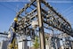 Staff Sgt. Manoj Williams, a 375th Civil Engineering Squadron electrical systems craftsman, greases framework knife blades and tightens loose conductor connections April 9, 2016, at Scott Air Force Base, Ill. The base required a scheduled power outage to repair critical high-voltage electrical components. (U.S. Air Force photo/Airman Daniel Garcia)                                                                    