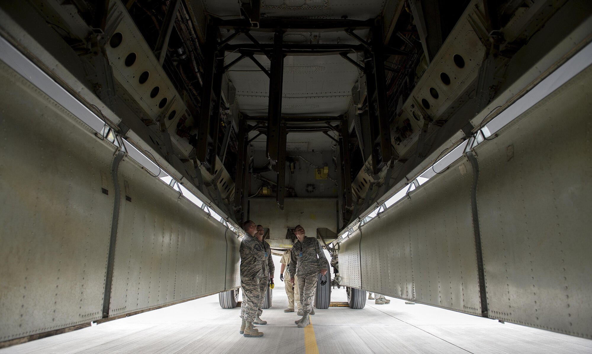 Airmen assigned to the 20th Expeditionary Bomb Squadron at Barksdale Air Force Base, La., inspect the bomb bay of a B-52 Stratofortress after arriving at Al Udeid Air Base, Qatar, April 9, 2016, to support Operation Inherent Resolve. The 19-nation air coalition consists of numerous precision strike aircraft and the B-52s will bring their unique capabilities to the fight against the Islamic State of Iraq and the Levant. (U.S. Air Force photo/Tech. Sgt. Nathan Lipscomb)                                                                                                                                                                       