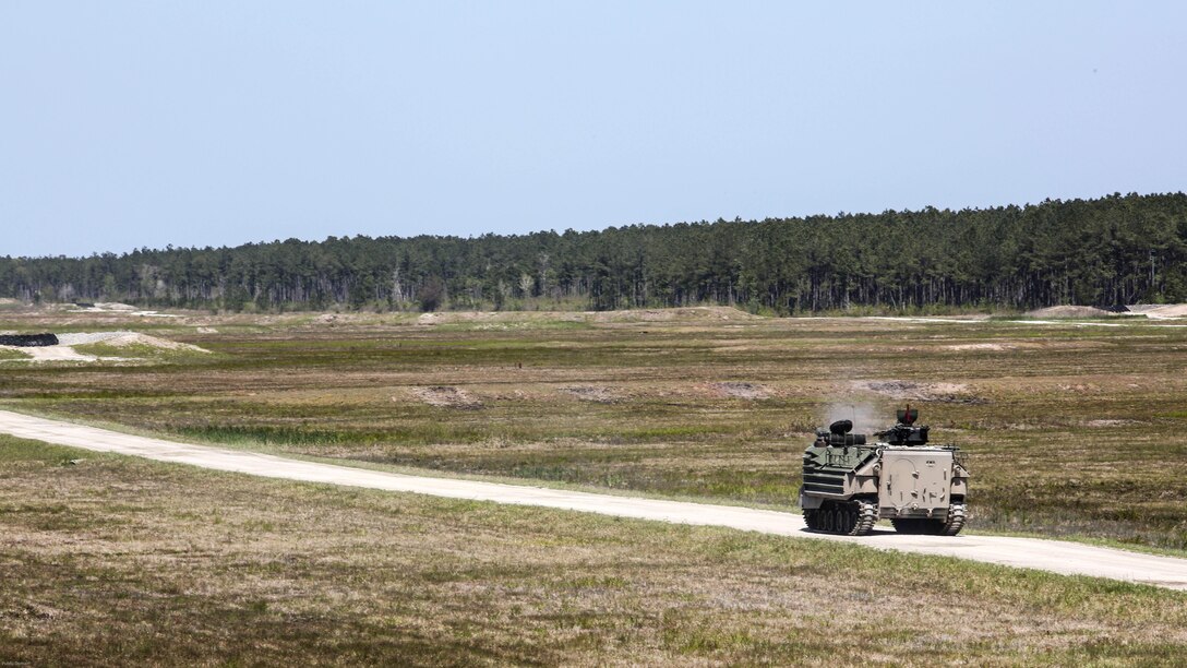 Marines with Alpha Company, 2nd Assault Amphibian Battalion fire on targets with their amphibious assault vehicle during a gunnery skills exercise at Marine Corps Base Camp Lejeune, N.C., April 13, 2016. Marines utilized the AAV’s .50 caliber machine gun and Mk-19 40mm grenade launcher to engage targets at distances between 400 and 2000 meters. 