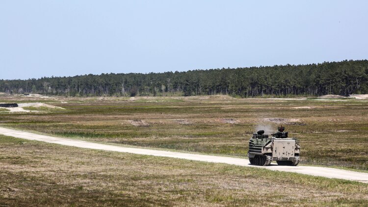 Marines with Alpha Company, 2nd Assault Amphibian Battalion fire on targets with their amphibious assault vehicle during a gunnery skills exercise at Marine Corps Base Camp Lejeune, N.C., April 13, 2016. Marines utilized the AAV’s .50 caliber machine gun and Mk-19 40mm grenade launcher to engage targets at distances between 400 and 2000 meters. 