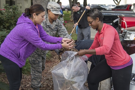 Airmen from Head Quarters Air Force Recruiting Service clean up leaves in front of the AFRS headquarters building April 8 at Joint Base San Antonio-Randolph. The 502nd Air Base Wing in coordination with the 502nd Civil Engineer Squadron conducted Proud Week Spring Cleanup to unite mission partners, tenant units, organizations and agencies throughout JBSA in an effort to enhance the appearance and beautification of JBSA and its facilities, conduct environmental maintenance and create a clean work environment.