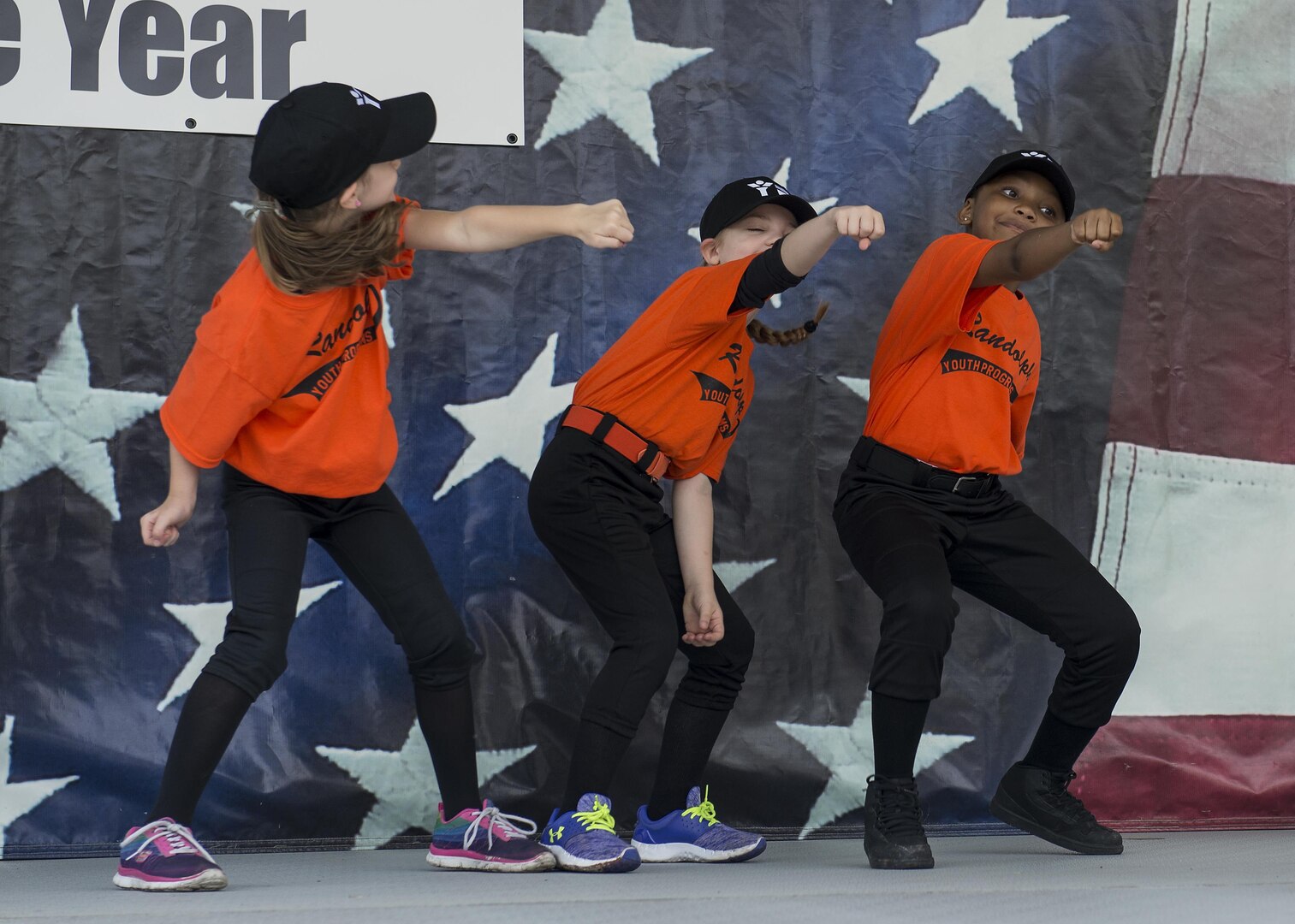 Players on the Randolph Youth Programs softball team dance during Famaganza at the Youth Programs Complex on JBSA-Randolph April 9, 2016. Famaganza is planned during the month of April to celebrate the Month of the Military Child. 