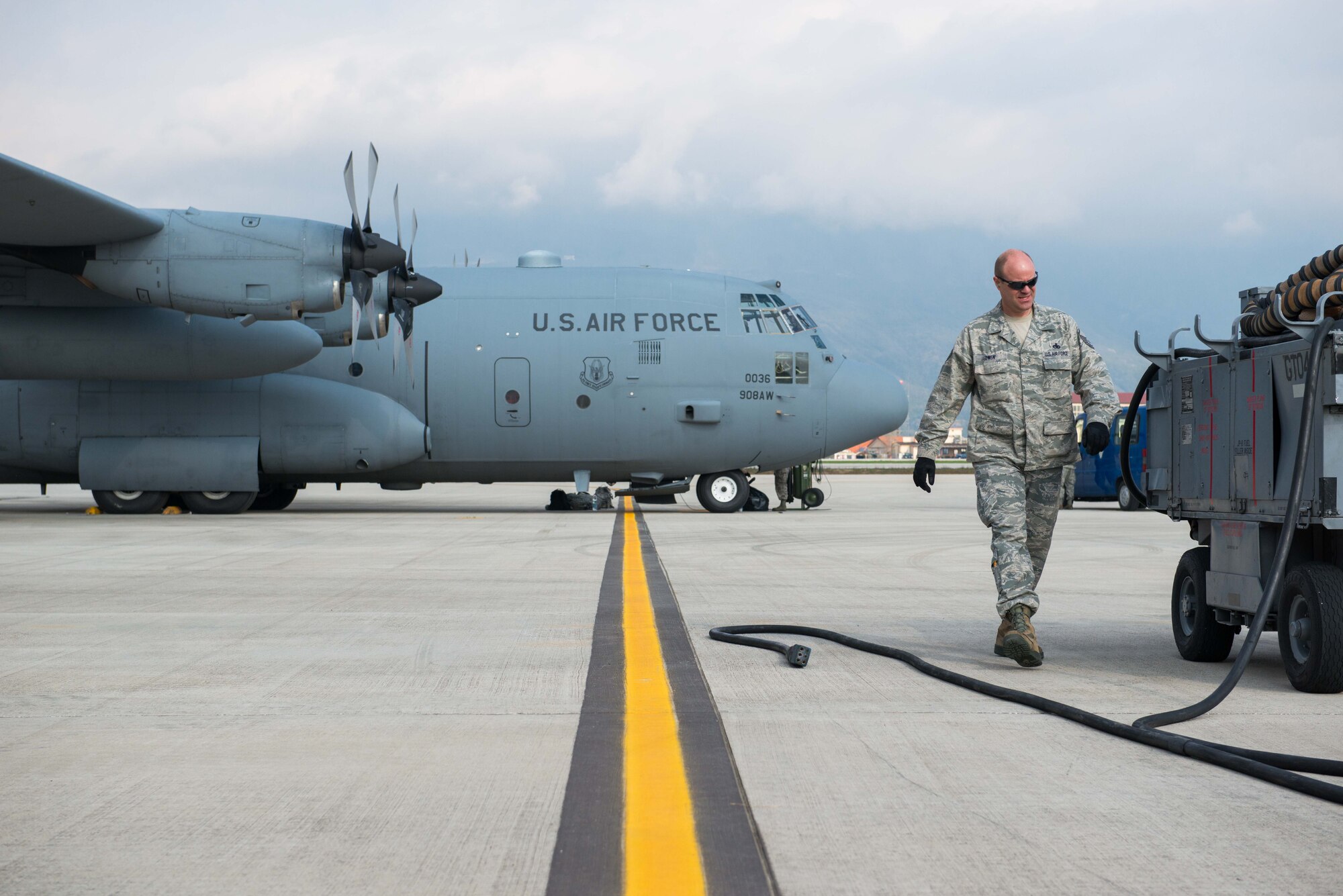 Master Sgt. Ian Owen, a crew chief from the Aircraft Maintenance Squadron, prepares the power cart of a C-130 during pre-flight preparations at Aviano AB, Italy, on 11 April, as a part of Exercise Saber Junction. (U.S. Air Force photo by Staff Sgt. Trevor Saylor)