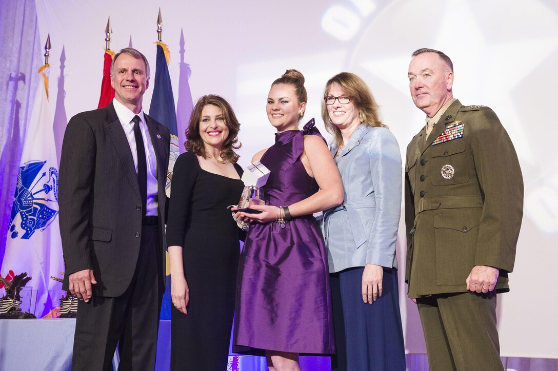 Elizabeth O'Brien, 17, center, poses for a photograph after receiving a Military Child of the Year Award during a gala in Arlington, Va., April 14, 2016. DoD photo by Army Staff Sgt. Sean K. Harp
