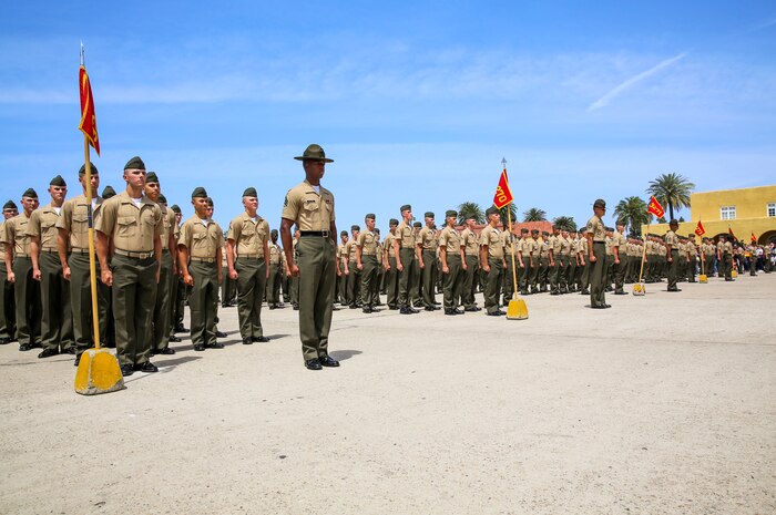 Marines from Mike Company, 3rd Recruit Training Battalion, stand in formation prior to beginning liberty call at Marine Corps Recruit Depot San Diego, April 14. Family Day allows the new Marines to reunite with families for the first time since leaving for Marine Corps recruit training. Annually, more than 17,000 males recruited from the Western Recruiting Region are trained at MCRD San Diego. Mike Company is scheduled to graduate April 15.