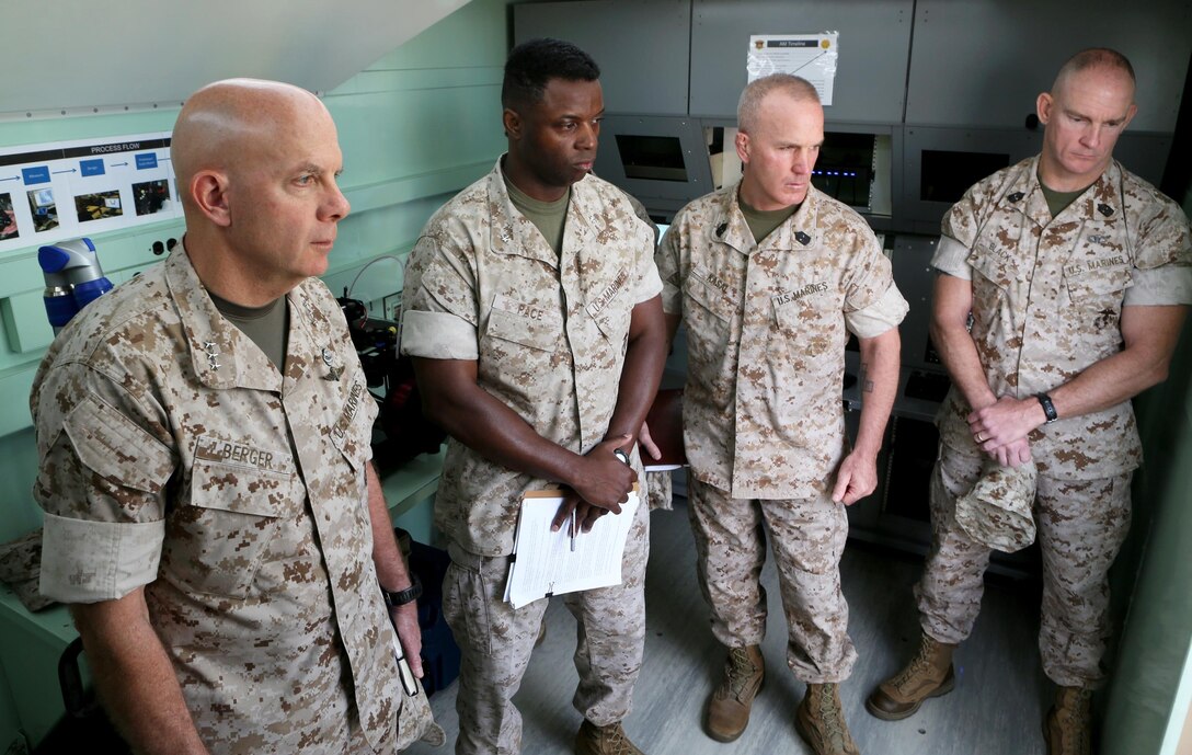 U.S. Marine Lt. Gen. David A. Berger and other high-level unit leaders receive a capabilities demonstration on 3-D printing technology aboard Camp Pendleton, Calif., April 6, 2016. Berger is the commanding general of I Marine Expeditionary Force. Marines with 1st Maintenance Battalion, Combat Logistics Regiment 15, 1st Marine Logistics Group, demonstrated the potential of 3-D printing capabilities to the commanders of I MEF and 1st MLG. Still in the testing phase, the battalion has already discovered endless possibilities as to how they can integrate the technology into their mission. (U.S. Marine Corps photo by Cpl. Carson Gramley/released)