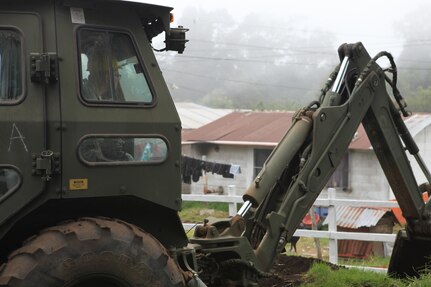 U.S. Army Sgt. Coty Marks with the 1038th Engineers works at the construction site for the Aldea Polopon clinic at Palo Gordo, Guatemala, March 29, 2016. Task Force Red Wolf and Army South conducts Humanitarian Civil Assistance Training to include tactical level construction projects and Medical Readiness Training Exercises providing medical access and building schools in Guatemala with the Guatemalan Government and non-government agencies from 05MAR16 to 18JUN16 in order to improve the mission readiness of US Forces and to provide a lasting benefit to the people of Guatemala. (U.S. Army photo by Sgt. Prosper Ndow/Released)
