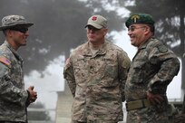 U.S. Army Lt. Col. Darrell Martin with Task Force (TF) Red Wolf talks to Coronel de Infanteria DEM. Carlos Guillermo Lopez Guitierrez of the Guatemalan army montana division at Palo Gordo, Guatemala, March 29, 2016. TF Red Wolf and Army South conducts Humanitarian Civil Assistance Training to include tactical level construction projects and Medical Readiness Training Exercises providing medical access and building schools in Guatemala with the Guatemalan Government and non-government agencies from 05MAR16 to 18JUN16 in order to improve the mission readiness of US Forces and to provide a lasting benefit to the people of Guatemala. (U.S. Army photo by Sgt. Prosper Ndow/Released)