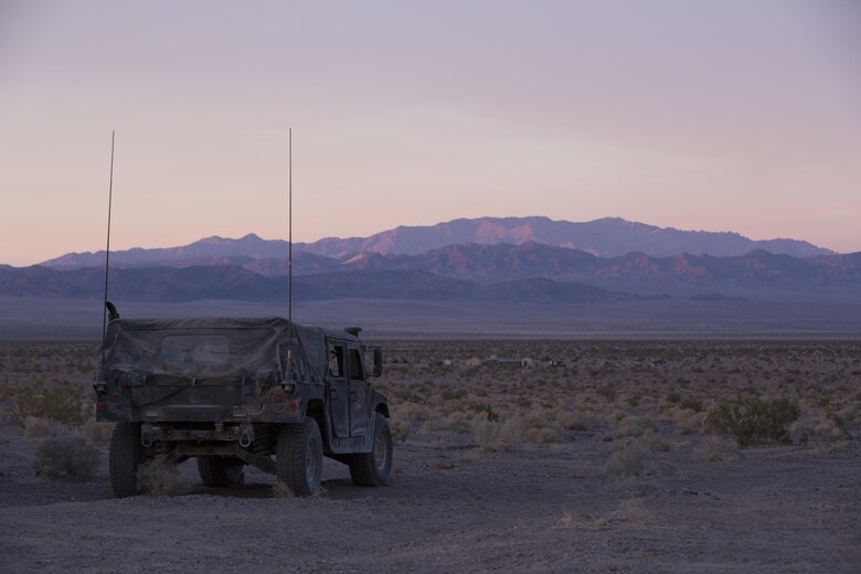 A High Mobility Multipurpose Wheeled Vehicle with 7th Marine Regiment stages at the Lead Mountain training area during the Regiment’s Combined Arms Live Fire Exercise aboard the Combat Center, April 5, 2016. CALFEX served as the kinetic portion of Desert Scimitar 16, an annual 1st Marine Division training evolution.  (Official Marine Corps photo by Cpl. Julio McGraw/ Released)