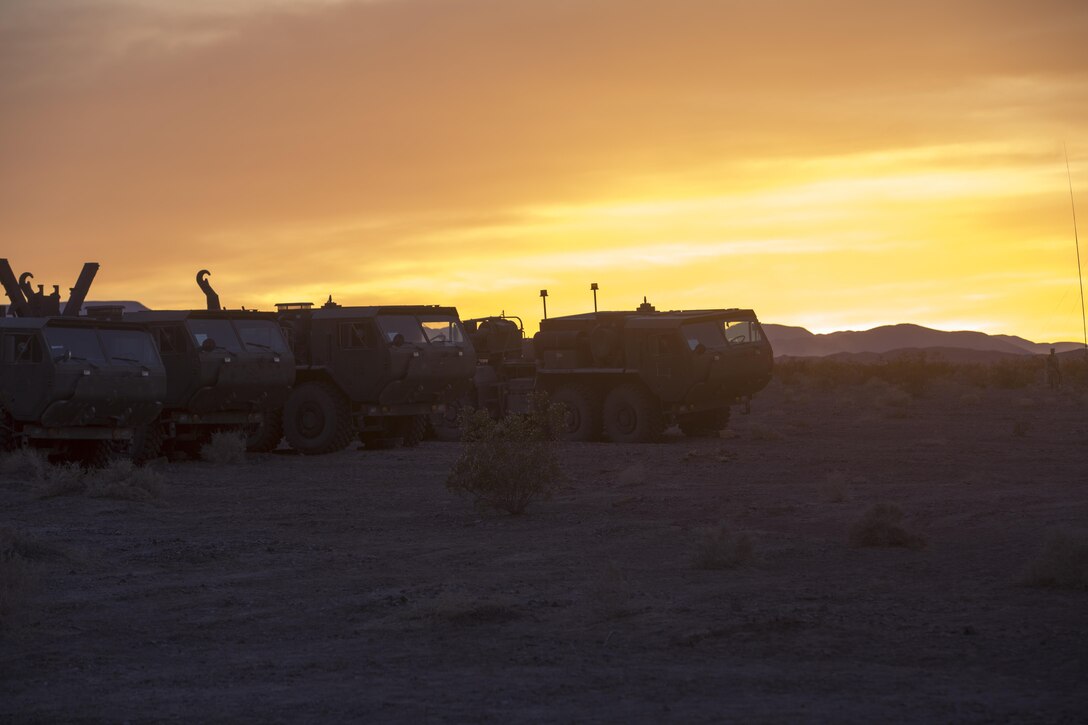 Logistics Vehicle System Replacements with Combat Logistics Battalion 7, prepare to move equipment at the Lead Mountain training area during 7th Marine Regiment’s Combined Arms Live Fire Exercise aboard the Combat Center April 5, 2016. CALFEX served as the kinetic portion of Desert Scimitar 16, an annual 1st Marine Division training evolution. (Official Marine Corps photo by Cpl. Julio McGraw/ Released)