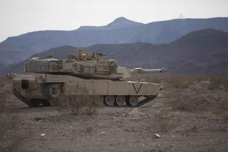 An M1A1 Abrams Main Battle Tank with Company B, 1st Tank Battalion, prepares to move toward its objective in the Blacktop training area during 7th Marine Regiment’s Combined Arms Live Fire Exercise aboard the Combat Center April 6, 2016. CALFEX served as the kinetic portion of Desert Scimitar 16, an annual 1st Marine Division training evolution. (Official Marine Corps photo by Cpl. Julio McGraw/ Released)