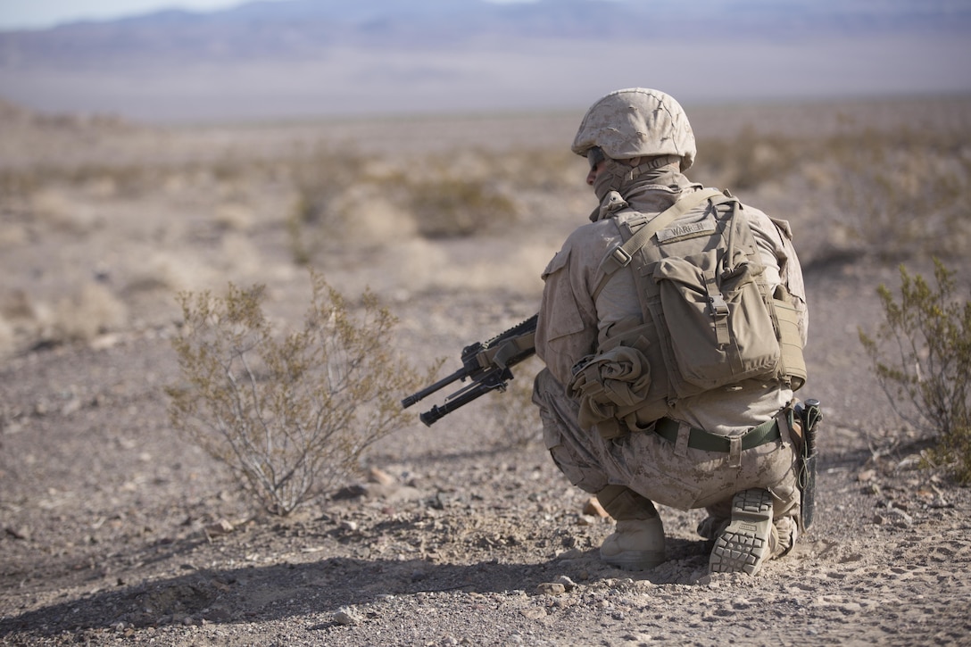 Lance Cpl. Daniel Warren, rifleman, Company C, 3rd Light Armored Reconnaissance Battalion, provides security in the Blacktop training area as part of the defensive portion of 7th Marine Regiment’s Combined Arms Live Fire Exercise aboard the Combat Center April 6, 2016. CALFEX served as the kinetic portion of Desert Scimitar 16, an annual 1st Marine Division training evolution. (Official Marine Corps photo by Cpl. Julio McGraw/ Released)